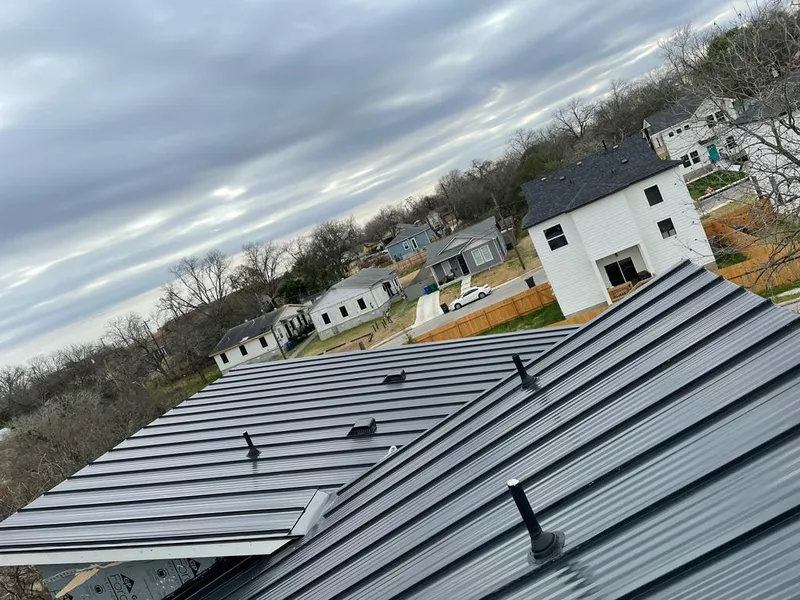 Standing seam metal roof panels with vents for Skylight Repair in Nashua